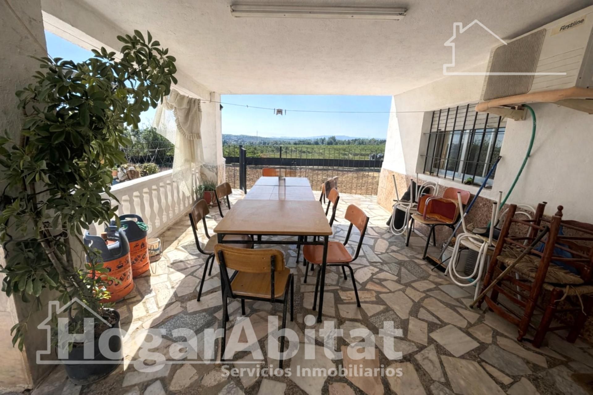 Terrassa de Casa o xalet en venda en Torrent amb Aire condicionat, Jardí privat i Terrassa