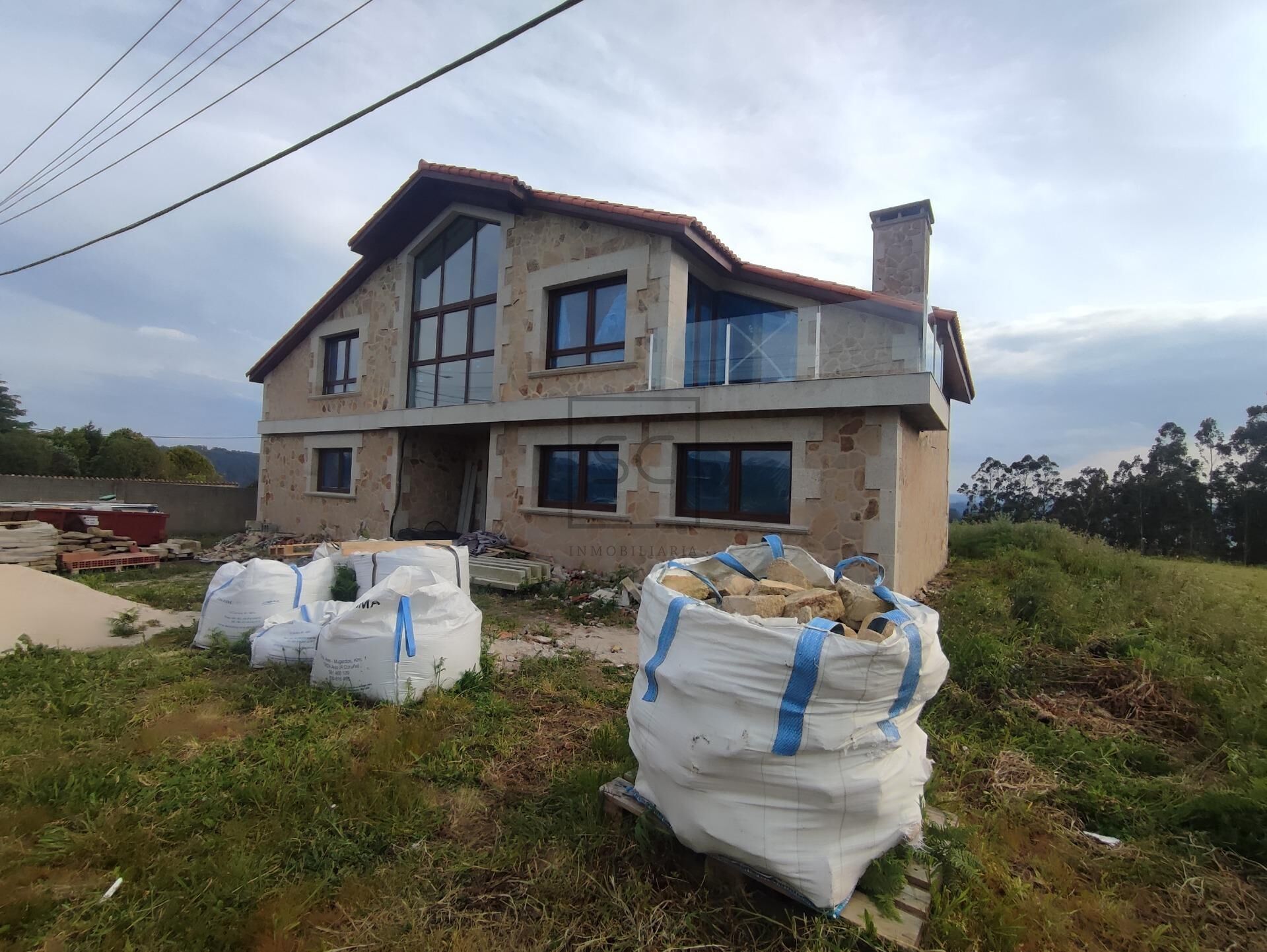 Vista exterior de Casa o xalet en venda en Miño amb Calefacció, Jardí privat i Terrassa