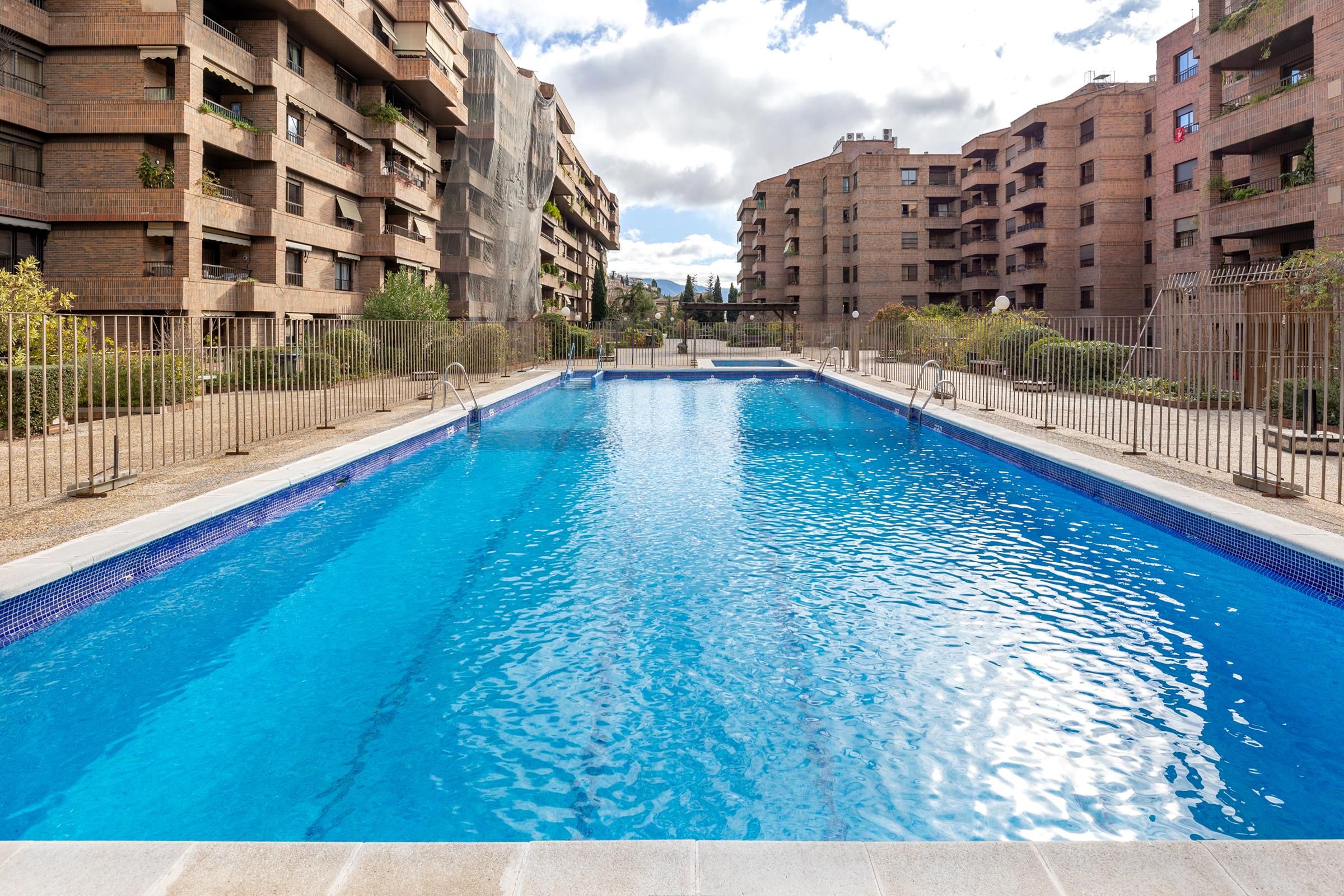 Swimming pool of Flat for sale in  Granada Capital  with Air Conditioner, Heating and Private garden