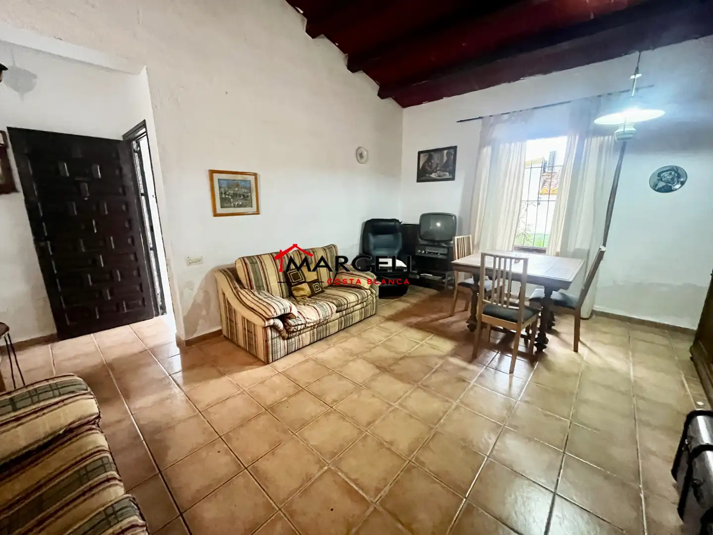 Sala d'estar de Casa o xalet en venda en Orihuela amb Jardí privat, Terrassa i Moblat
