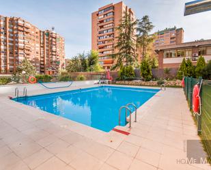 Swimming pool of Flat for sale in  Madrid Capital  with Air Conditioner and Terrace