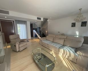 Sala d'estar de Casa adosada en venda en Castell-Platja d'Aro amb Aire condicionat, Jardí privat i Terrassa