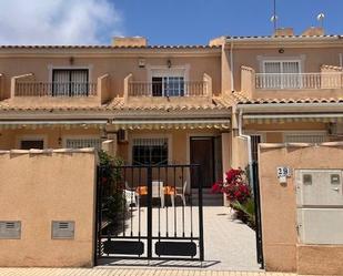 Vista exterior de Dúplex en venda en Pilar de la Horadada amb Aire condicionat, Calefacció i Jardí privat