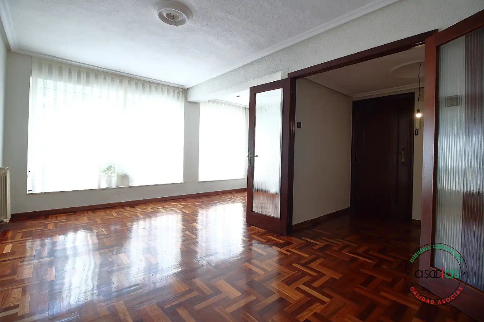 Living room of Flat for sale in Gijón   with Heating, Parquet flooring and Storage room