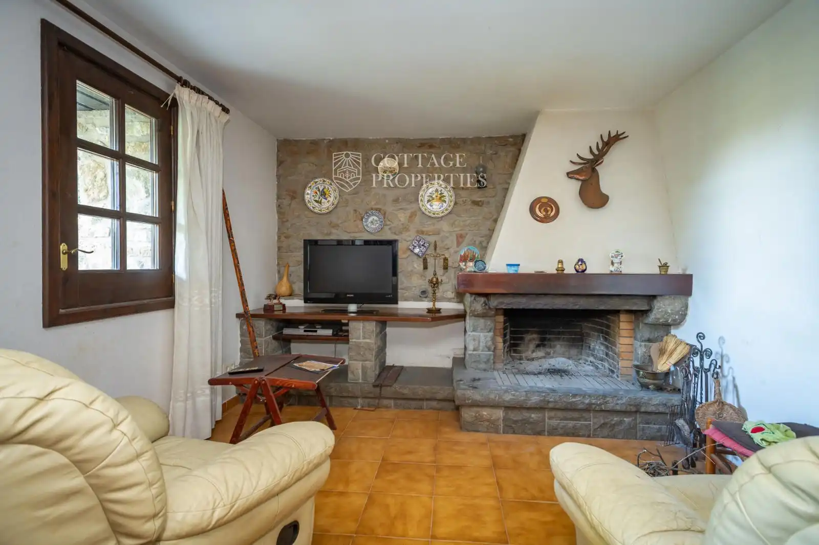 Sala de estar de Finca rústica en venta en Sant Miquel de Campmajor con Calefacción y Piscina