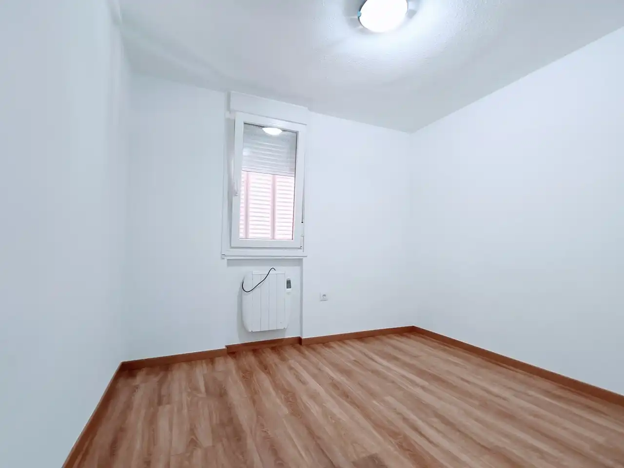 Habitación de Piso de alquiler en Madrid con Terraza y Microondas