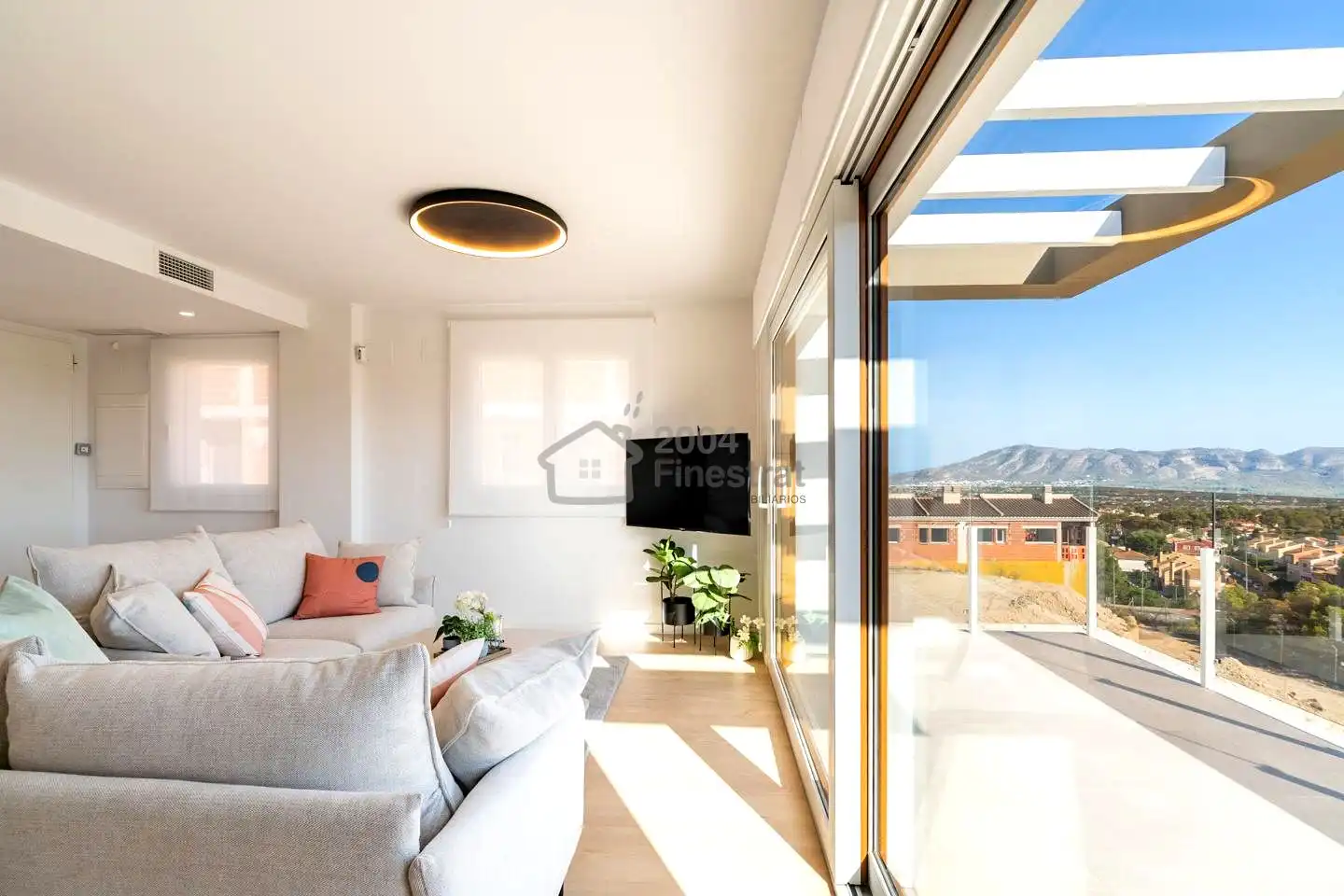 Sala de estar de Casa adosada en venta en La Nucia con Aire acondicionado, Jardín privado y Terraza