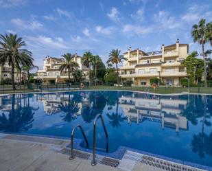 Swimming pool of Flat for sale in Sotogrande  with Air Conditioner, Terrace and Storage room