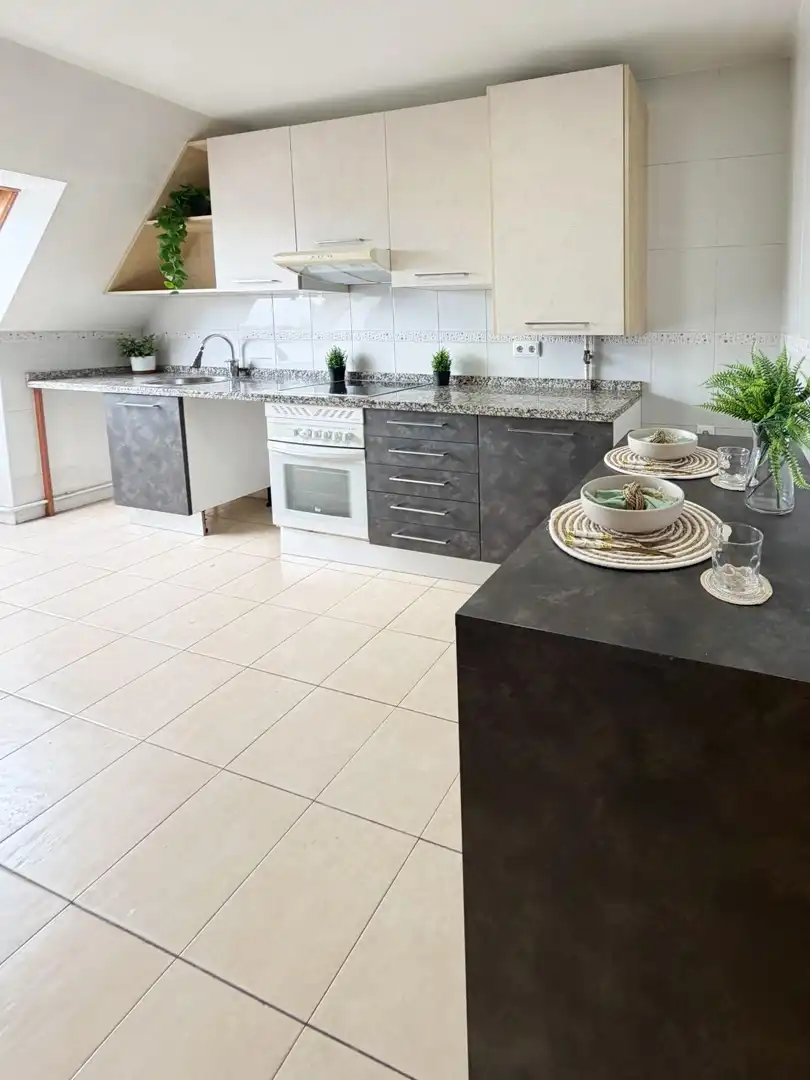 Kitchen of Attic for sale in Oviedo   with Heating, Parquet flooring and Storage room