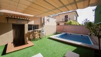 Swimming pool of Single-family semi-detached for sale in Ogíjares  with Air Conditioner, Terrace and Swimming Pool