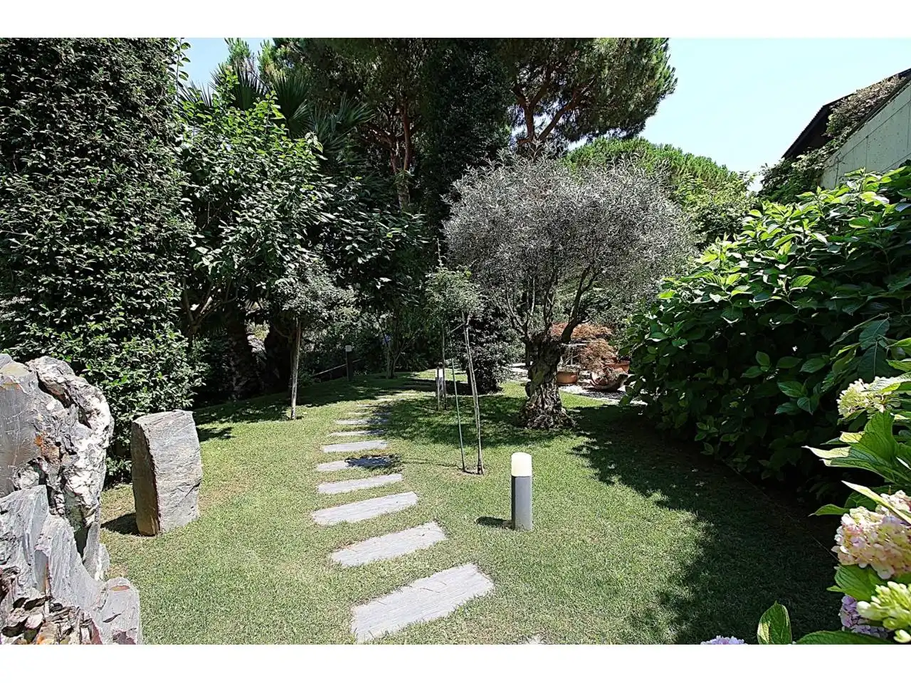 Garten von Wohnung zum Verkauf in Lloret de Mar mit Klimaanlage, Heizung und Privatgarten