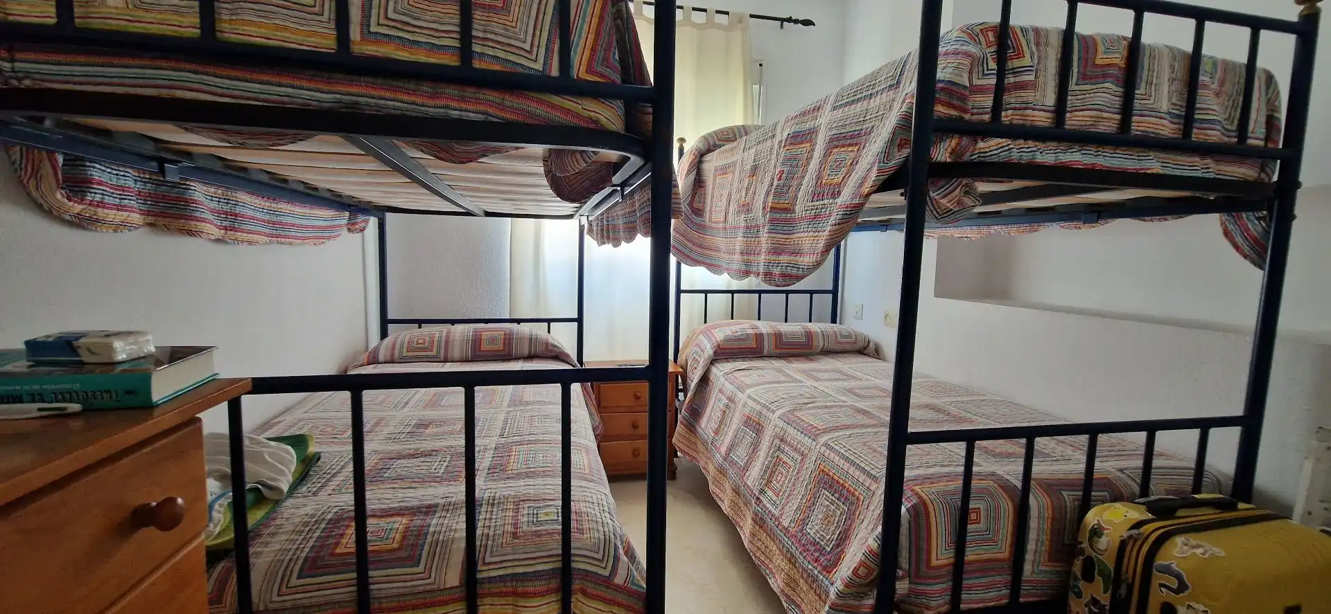 Dormitori de Apartament de lloguer en El Portil amb Moblat i Piscina comunitària