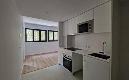 Kitchen of Duplex for sale in Girona Capital  with Air Conditioner