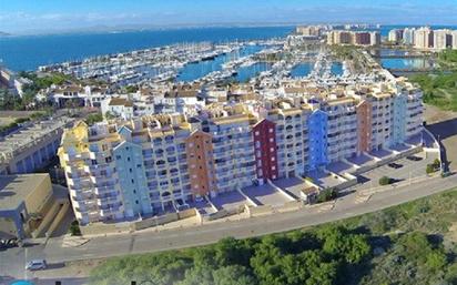 Vista exterior de Apartament en venda en La Manga del Mar Menor amb Calefacció, Jardí privat i Terrassa