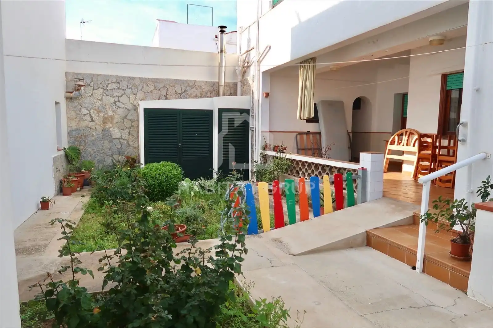 Garten von Wohnung zum Verkauf in Es Castell mit Heizung und Privatgarten