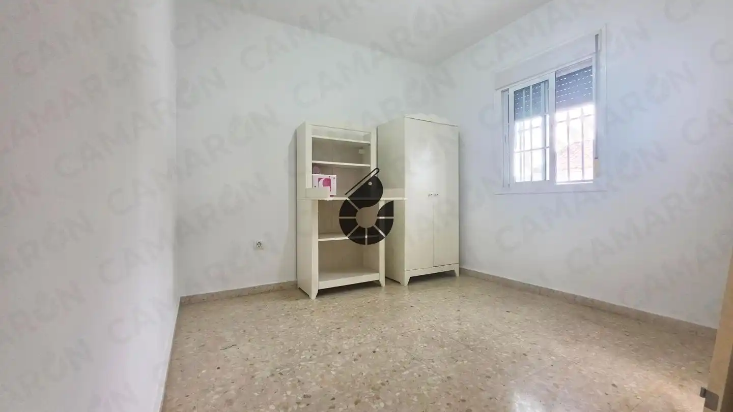Habitación de Casa adosada en venta en Coria del Río con Aire acondicionado