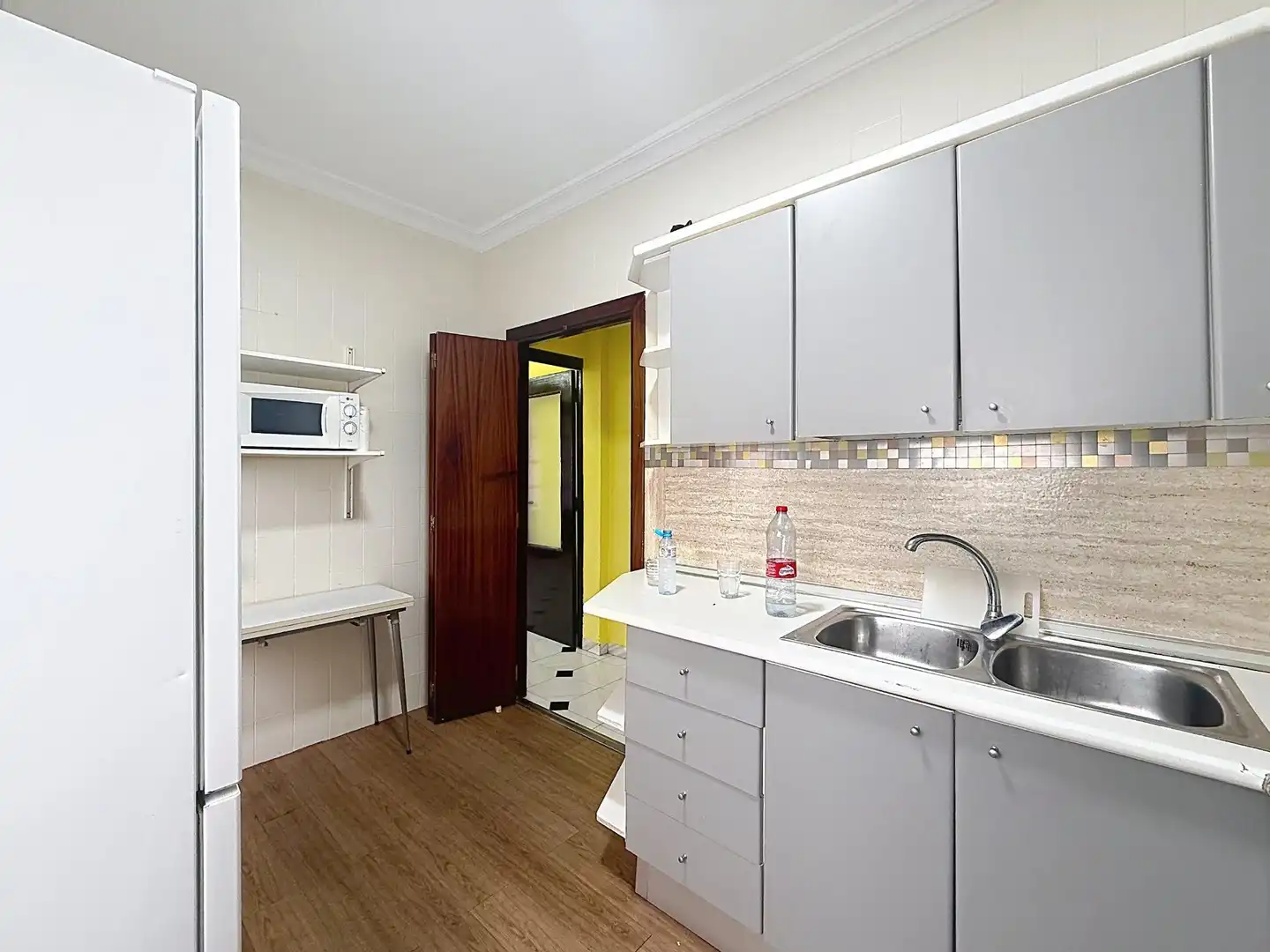 Kitchen of Flat for sale in Sevilla  with Air Conditioner, Terrace and Furnished