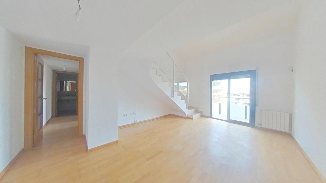 Sala d'estar de Dúplex en venda en Girona Capital amb Terrassa