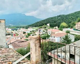 Vista exterior de Casa adosada en venda en La Vall d'en Bas amb Calefacció, Terrassa i Traster