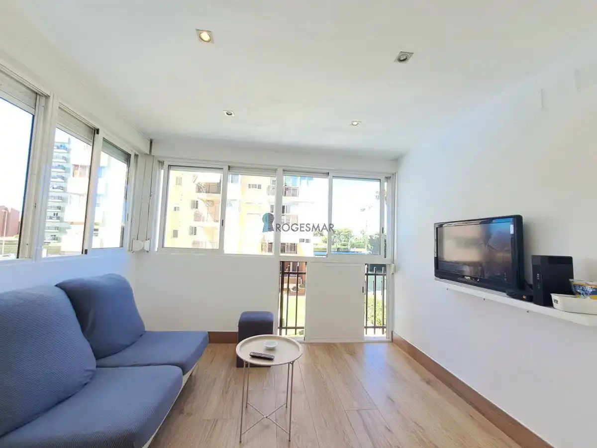 Sala d'estar de Apartament en venda en Benicasim / Benicàssim amb Traster, Moblat i Piscina comunitària