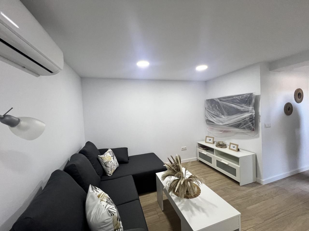 Sala de estar de Planta baja para compartir en Málaga Capital con Aire acondicionado, Terraza y Amueblado