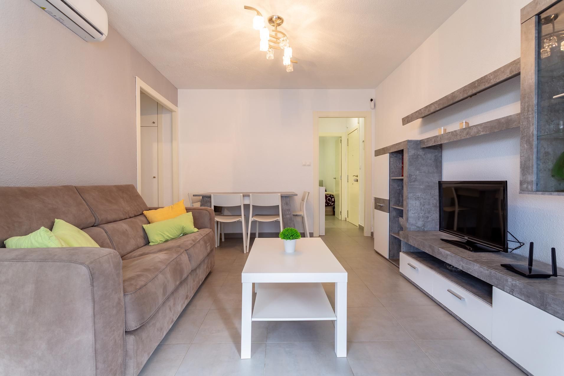 Sala d'estar de Apartament en venda en Salou amb Aire condicionat, Calefacció i Jardí privat