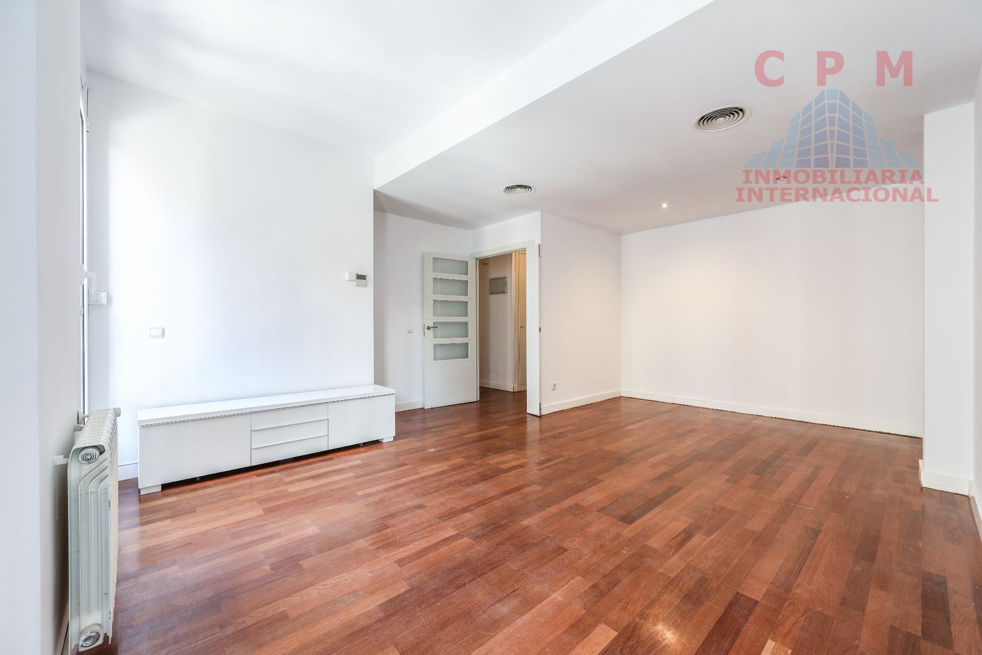 Living room of Duplex to rent in  Madrid Capital  with Air Conditioner, Heating and Parquet flooring