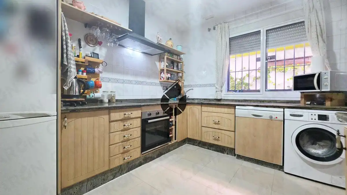 Cocina de Casa adosada en venta en Coria del Río con Aire acondicionado, Parquet y Terraza