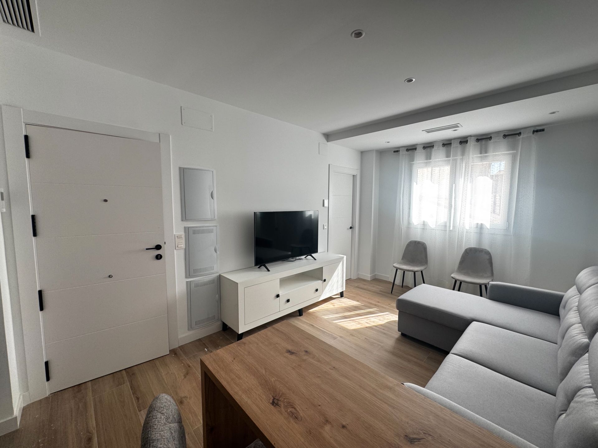 Living room of Apartment to rent in Maracena  with Air Conditioner, Parquet flooring and Furnished