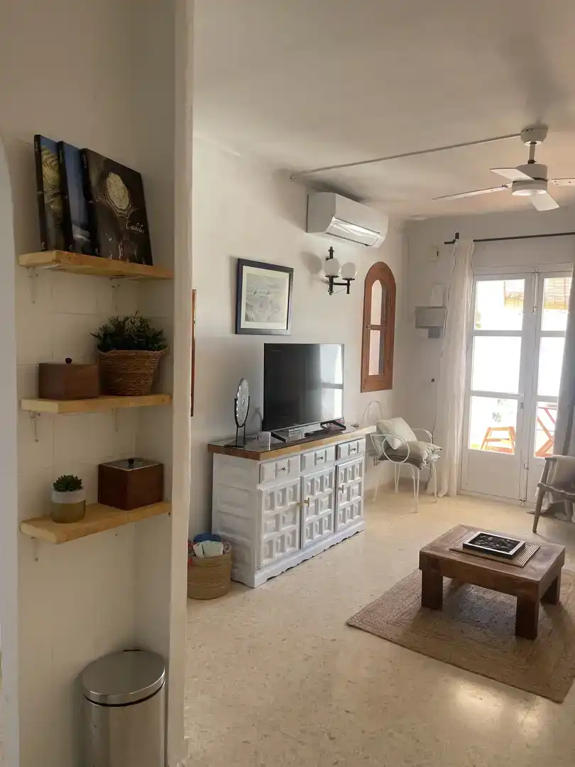 Sala de estar de Piso en venta en Nerja con Aire acondicionado, Jardín privado y Piscina