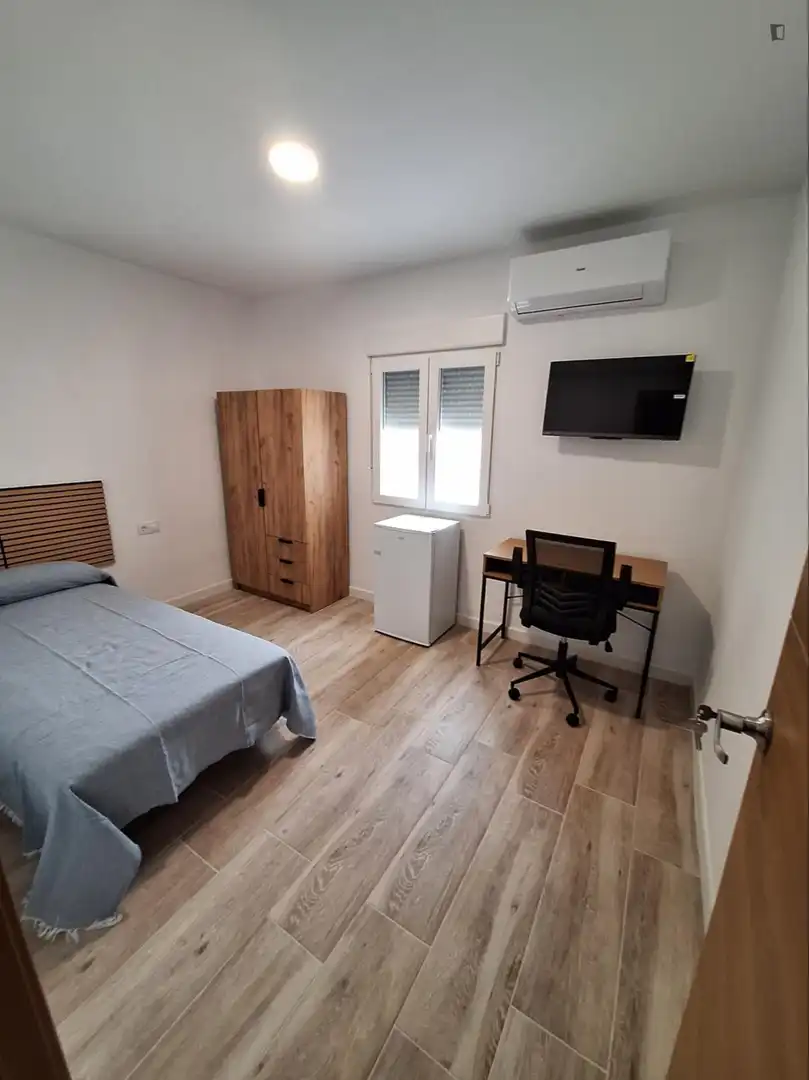 Habitación de Apartamento de alquiler en Valencia con Aire acondicionado, Calefacción y Amueblado