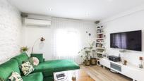 Sala d'estar de Apartament en venda en  Madrid Capital amb Aire condicionat, Calefacció i Moblat