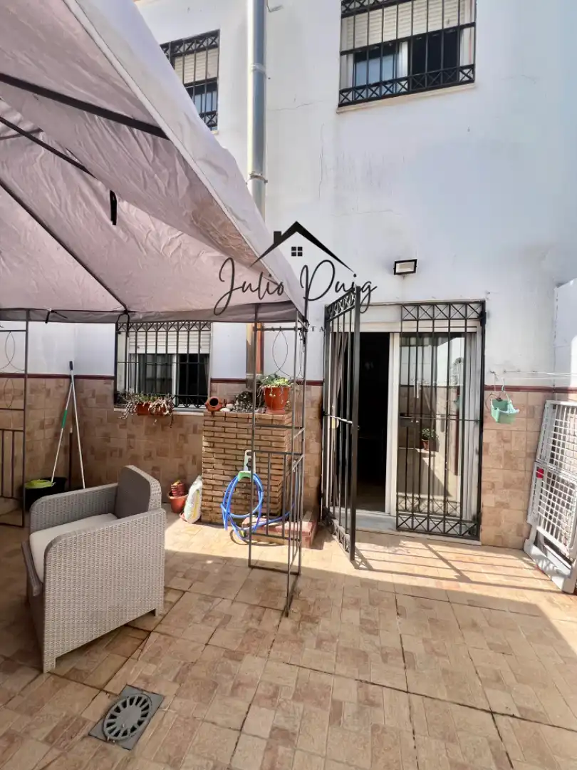 Exterior view of Detached homes for sale in Coria del Río  with Air Conditioner and Balcony