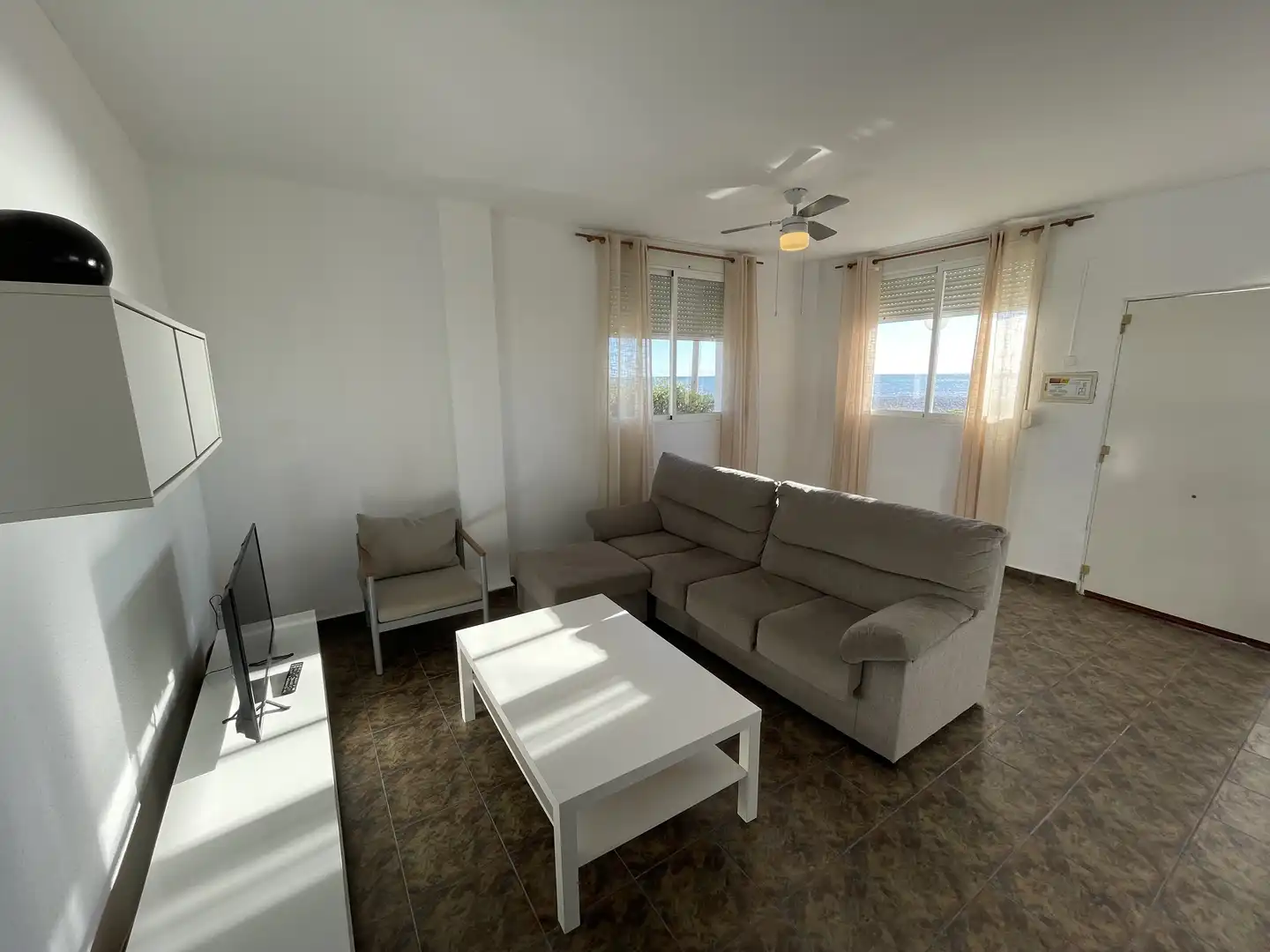 Sala d'estar de Apartament en venda en Alcalà de Xivert amb Jardí privat, Terrassa i Piscina