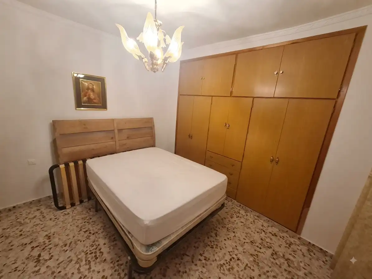 Habitación de Casa adosada en venta en Carrión de Calatrava con Calefacción, Terraza y Trastero