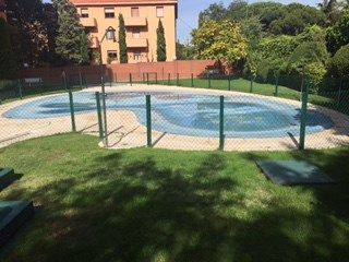Swimming pool of Flat for sale in  Madrid Capital  with Air Conditioner, Heating and Parquet flooring