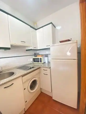 Cuina de Apartament en venda en La Antilla amb Terrassa, Traster i Moblat