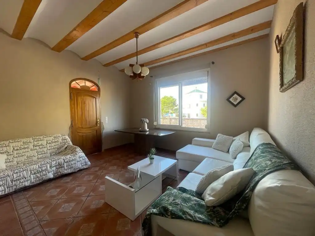 Sala d'estar de Casa o xalet en venda en Cullera amb Aire condicionat, Jardí privat i Terrassa