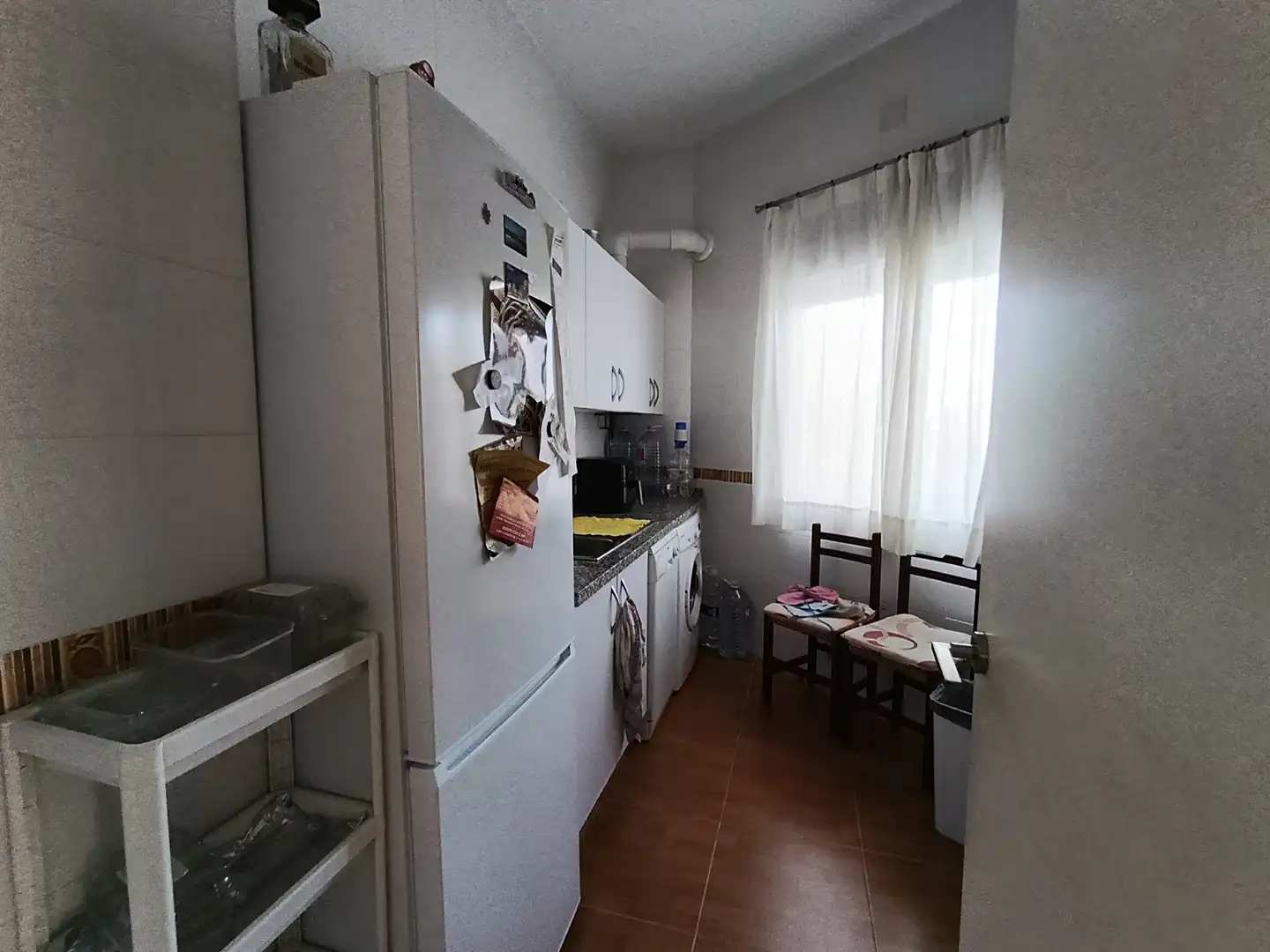 Küche von Erdgeschoss zum Verkauf in Punta Umbría mit Möbliert, Ofen und Waschmaschine