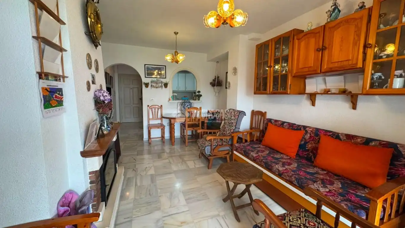 Sala de estar de Dúplex en venta en Motril con Terraza, Piscina y Piscina comunitaria