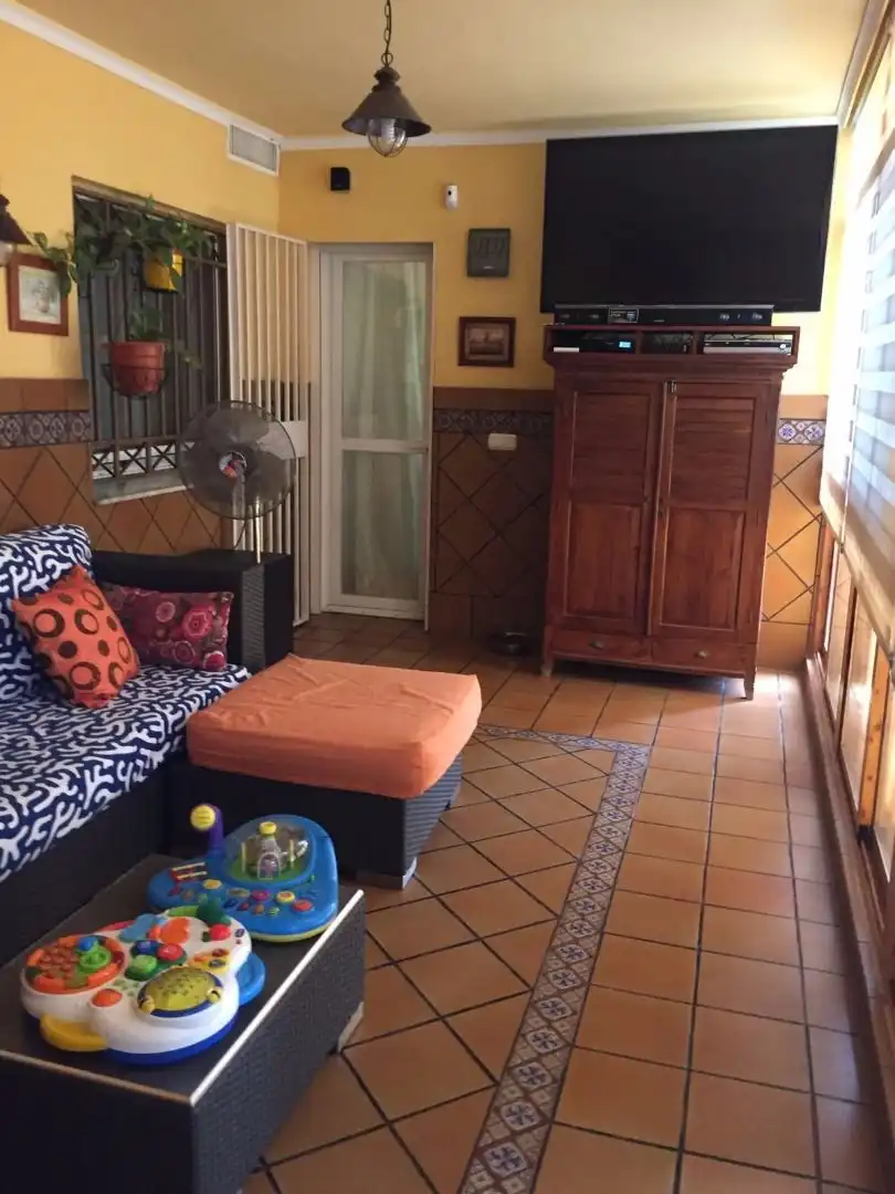 Sala de estar de Casa adosada en venta en Melilla con Aire acondicionado, Jardín privado y Terraza