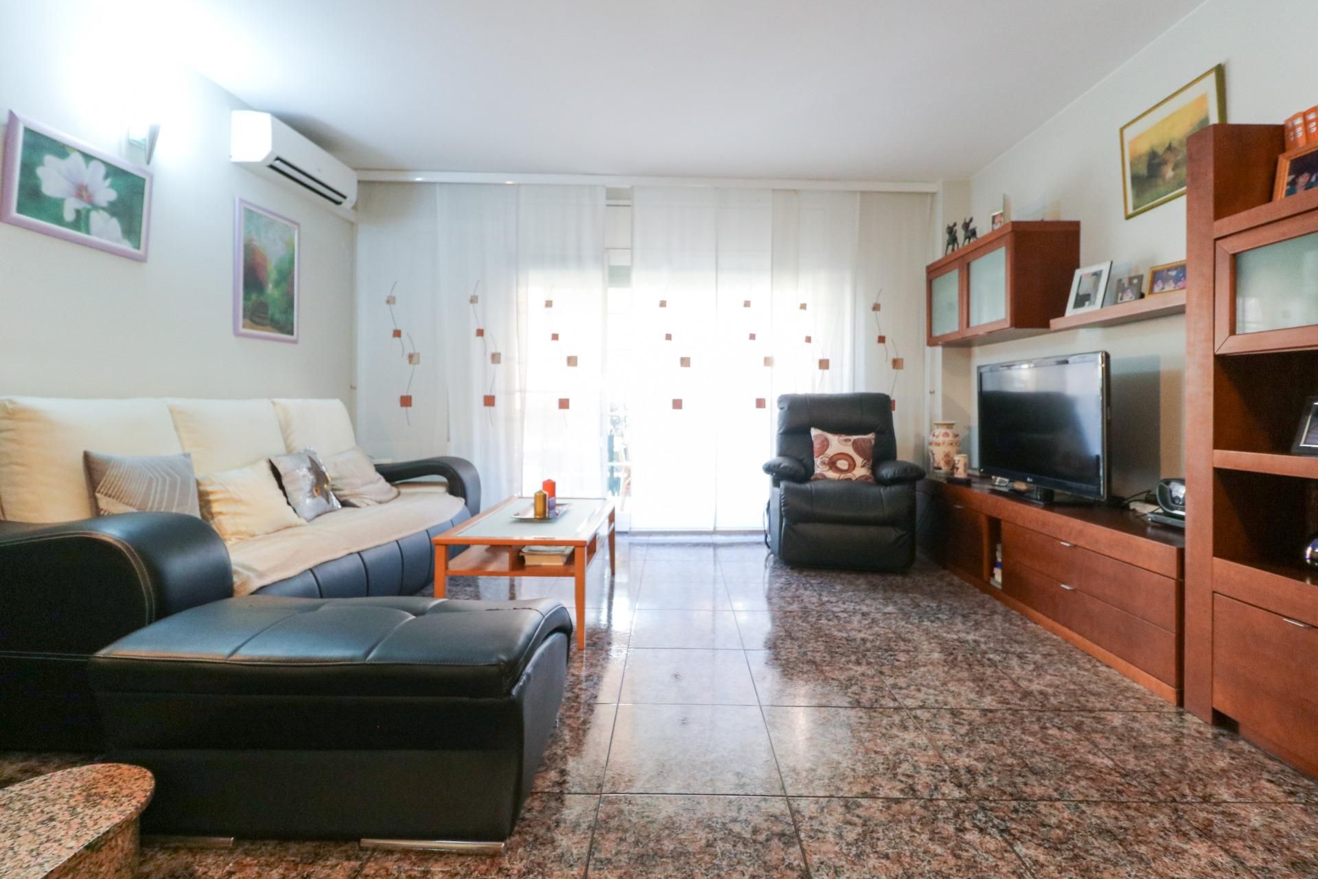 Sala d'estar de Casa adosada en venda en Castelldefels amb Aire condicionat, Calefacció i Balcó