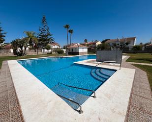 Swimming pool of Single-family semi-detached for sale in Málaga Capital  with Air Conditioner, Heating and Private garden