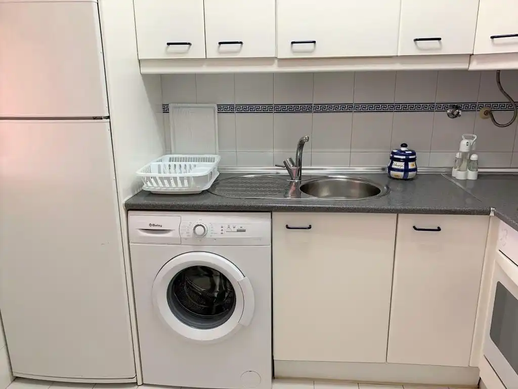 Cocina de Piso de alquiler en El Portil con Jardín privado, Terraza y Piscina