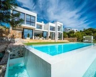 Vista exterior de Casa o xalet de lloguer en Orihuela amb Piscina i Alarma