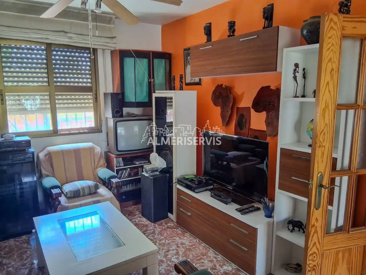 Sala de estar de Casa adosada en venta en El Ejido con Aire acondicionado, Terraza y Amueblado