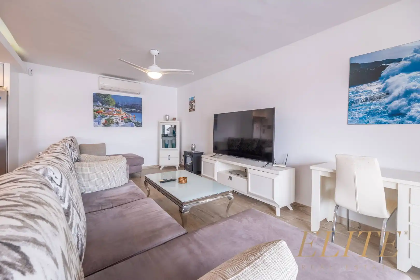 Sala d'estar de Casa adosada en venda en Mogán amb Aire condicionat, Terrassa i Traster
