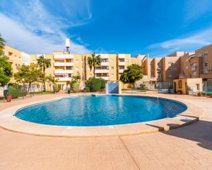 Swimming pool of Flat for sale in Roquetas de Mar  with Air Conditioner, Heating and Storage room