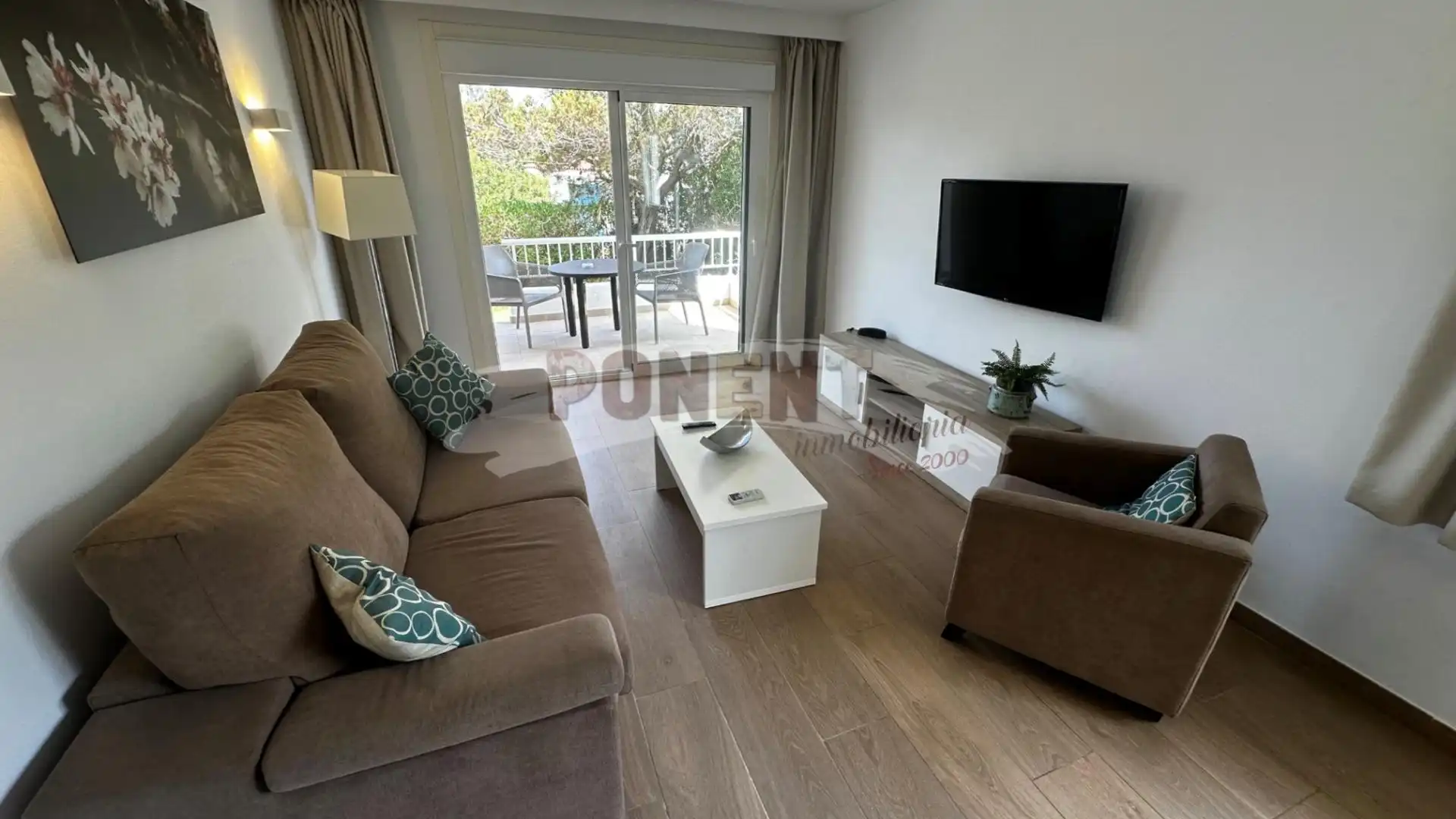 Sala d'estar de Apartament en venda en Sant Josep de sa Talaia amb Aire condicionat, Terrassa i Moblat