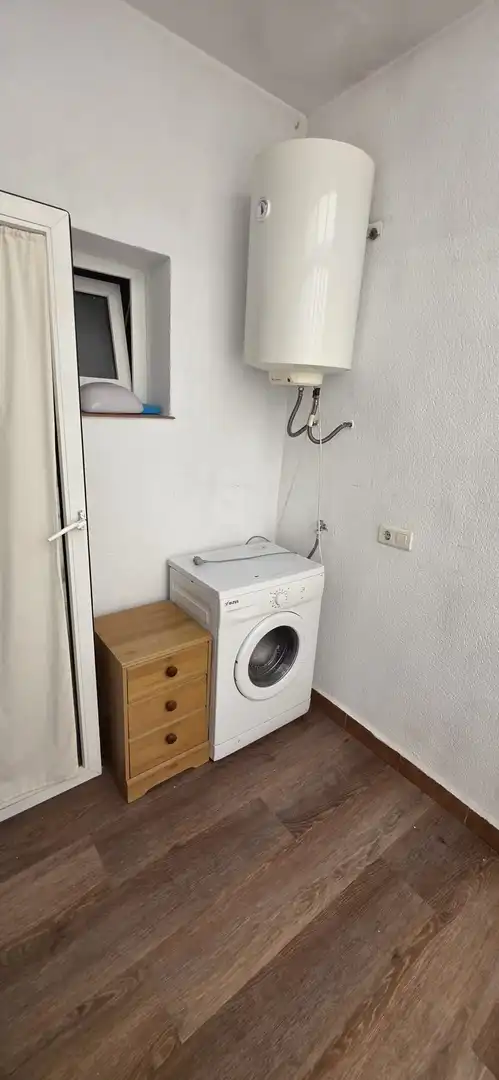 Dormitori de Apartament de lloguer en Benalmádena amb Terrassa i Piscina comunitària